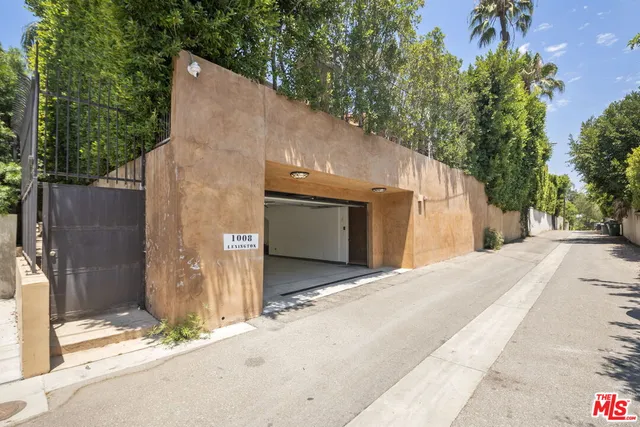 a house with trees in front of it