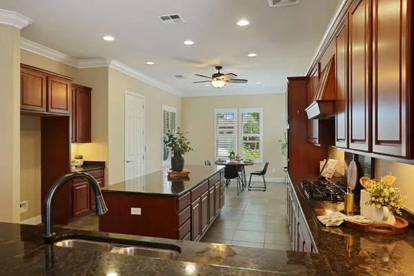 a view of a swimming pool with a patio