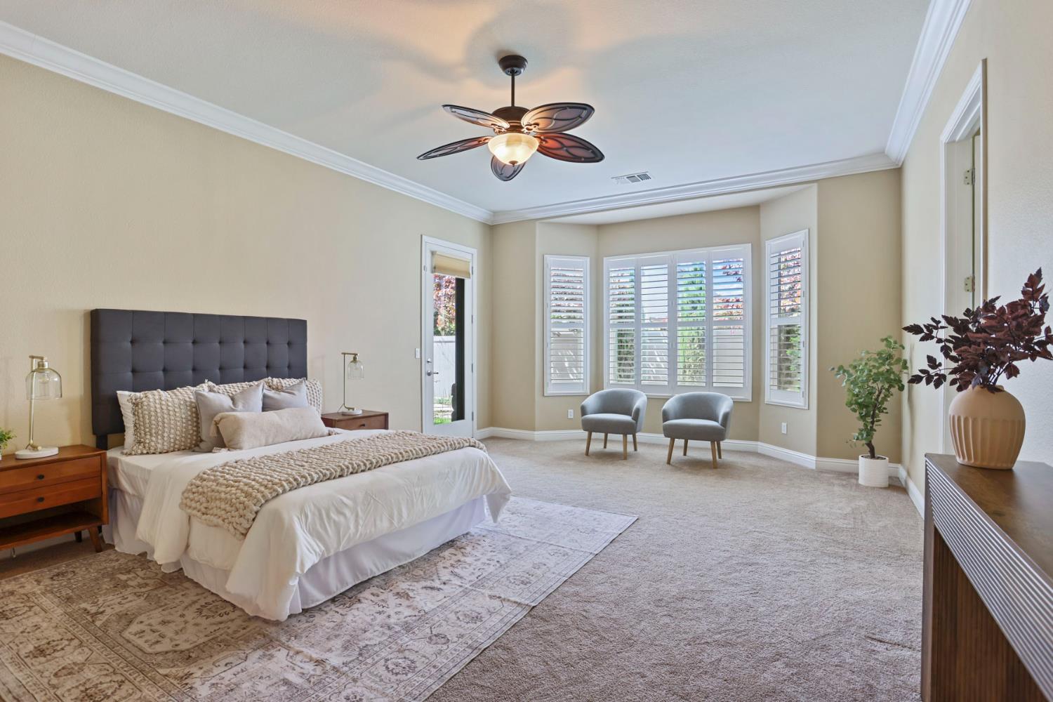 2439 Appleleaf Lane Manteca, CA 95336 - Photo 35 of 73 a spacious bedroom with a bed and a large window