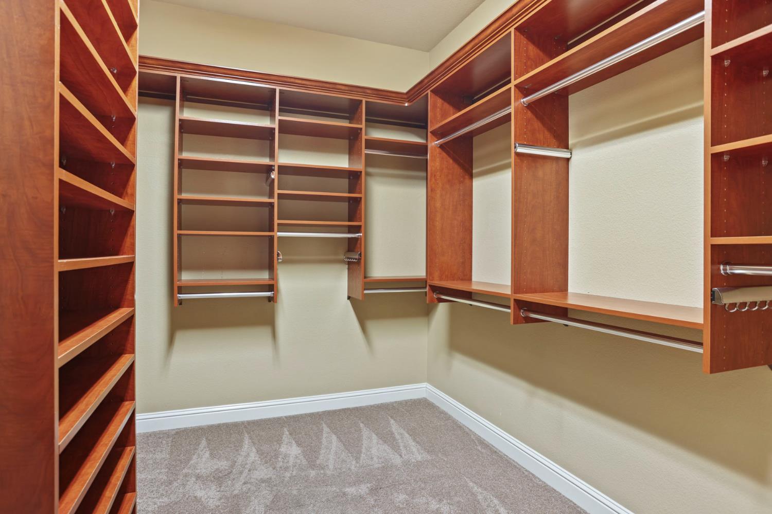 2439 Appleleaf Lane Manteca, CA 95336 - Photo 40 of 73 a view of an empty walk in closet
