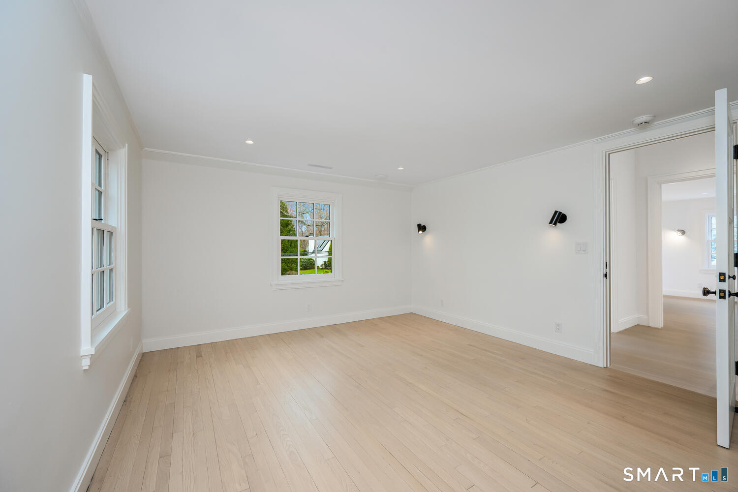 32 Birch Road Darien, CT 06820 - Photo 25 of 40 wooden floor in an empty room with a window