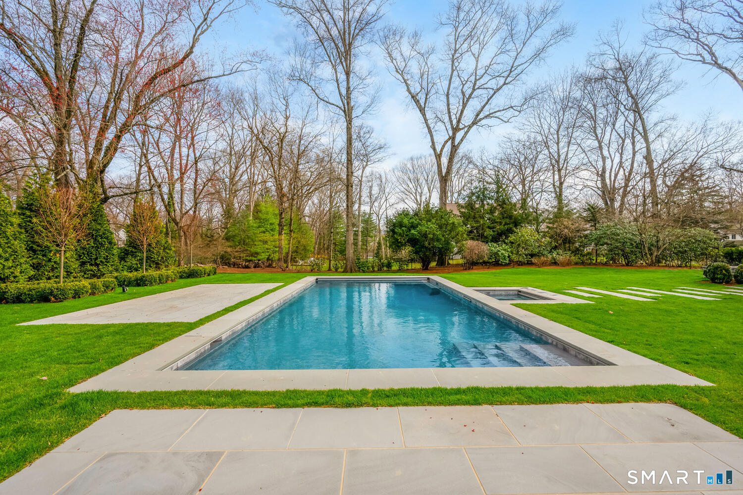 32 Birch Road Darien, CT 06820 - Photo 36 of 40 a view of outdoor space swimming pool and green space
