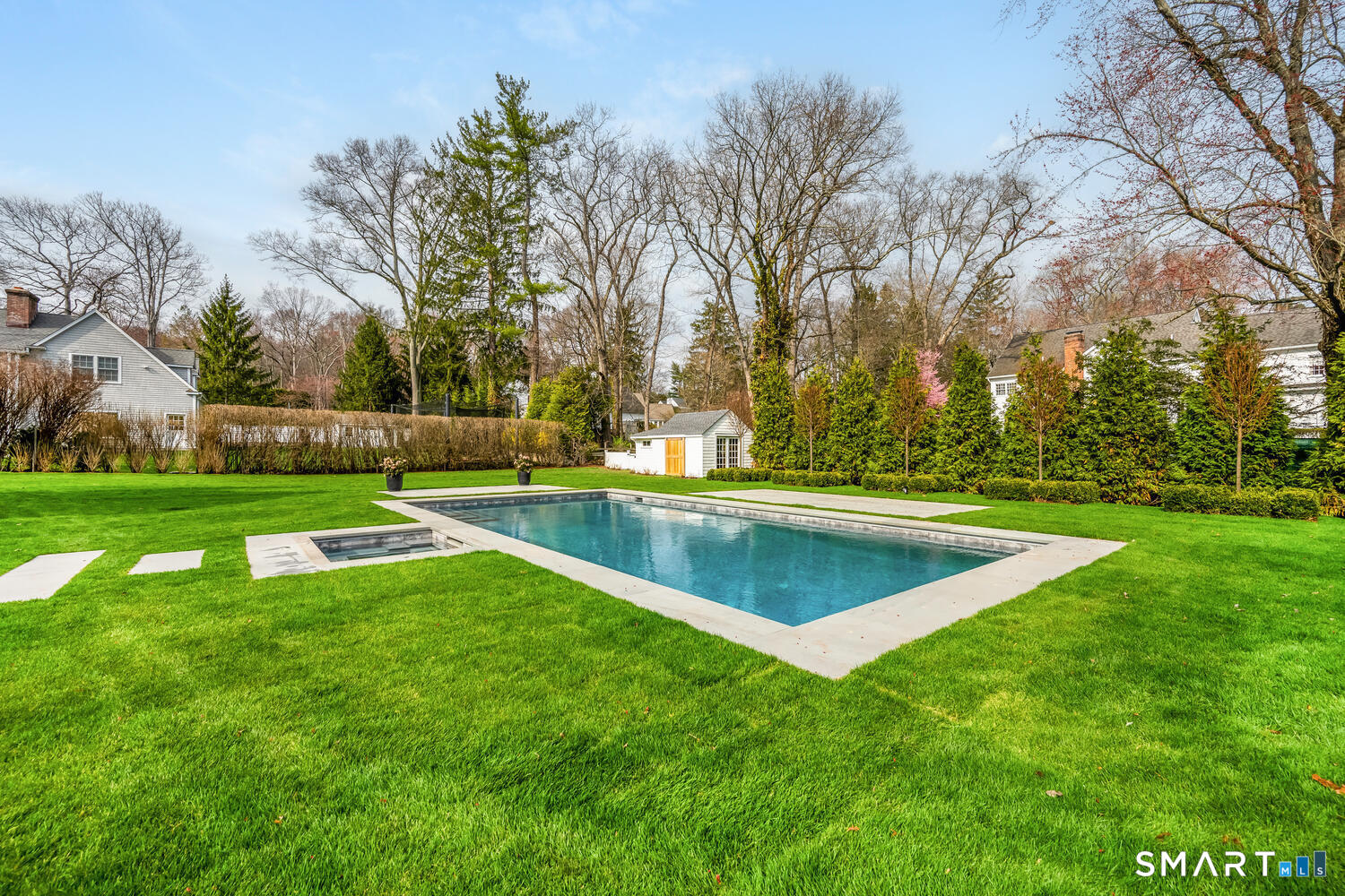 32 Birch Road Darien, CT 06820 - Photo 38 of 40 a view of a swimming pool with a yard