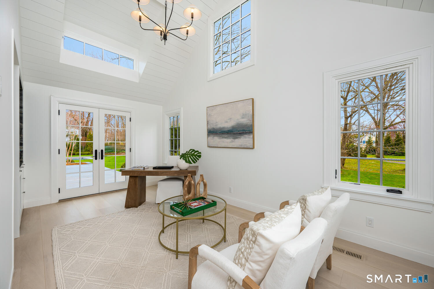 32 Birch Road Darien, CT 06820 - Photo 7 of 40 a living room with furniture and a window