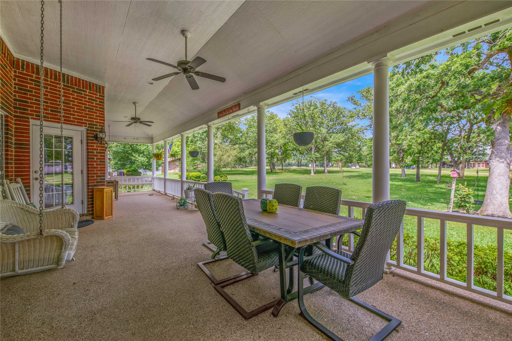 7 Hickory Ridge Lane Normangee, TX 77871 - Photo 35 of 45 a view of a patio with a table chairs and a backyard