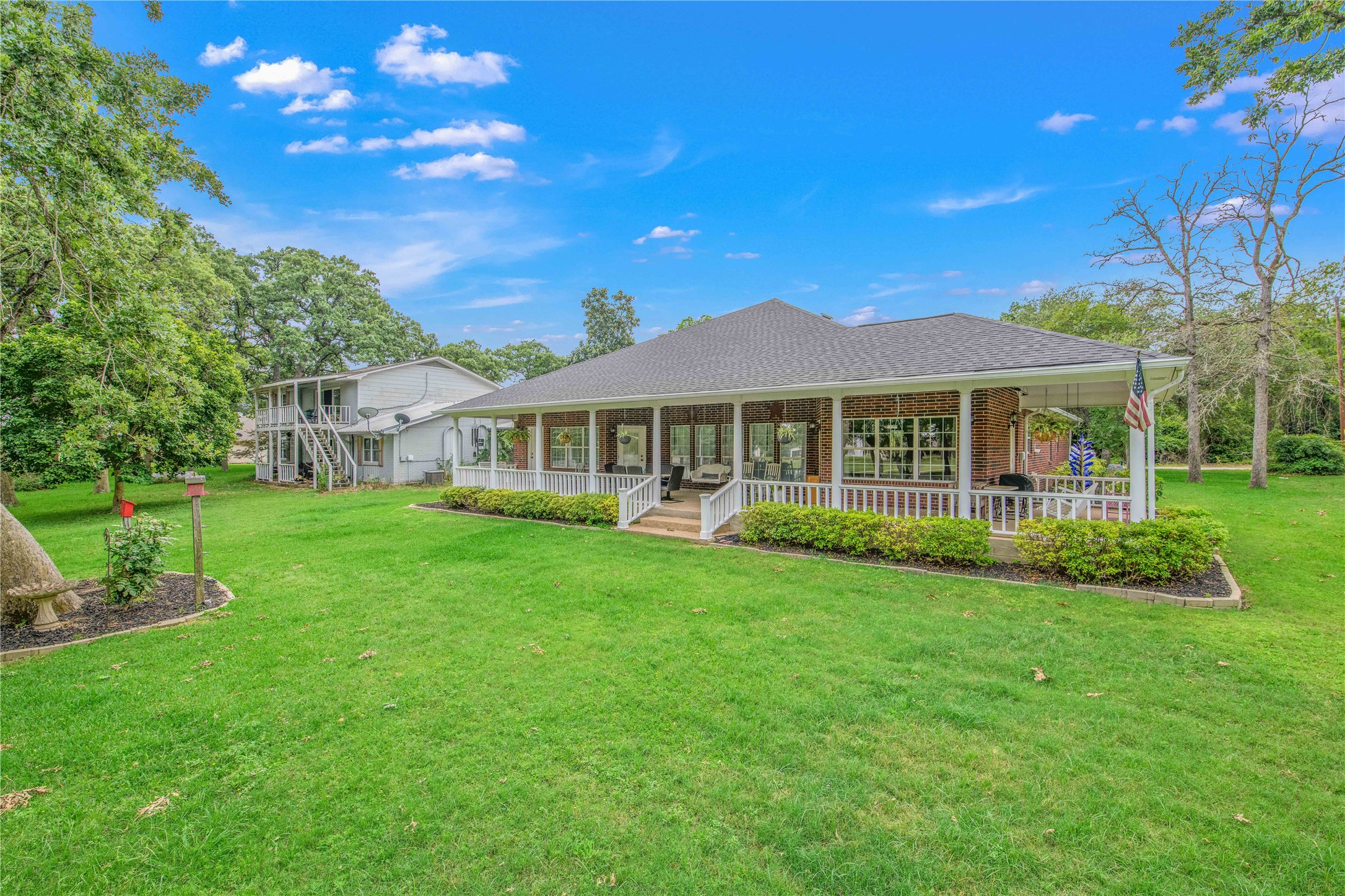 7 Hickory Ridge Lane Normangee, TX 77871 - Photo 40 of 45 a front view of a house with a garden