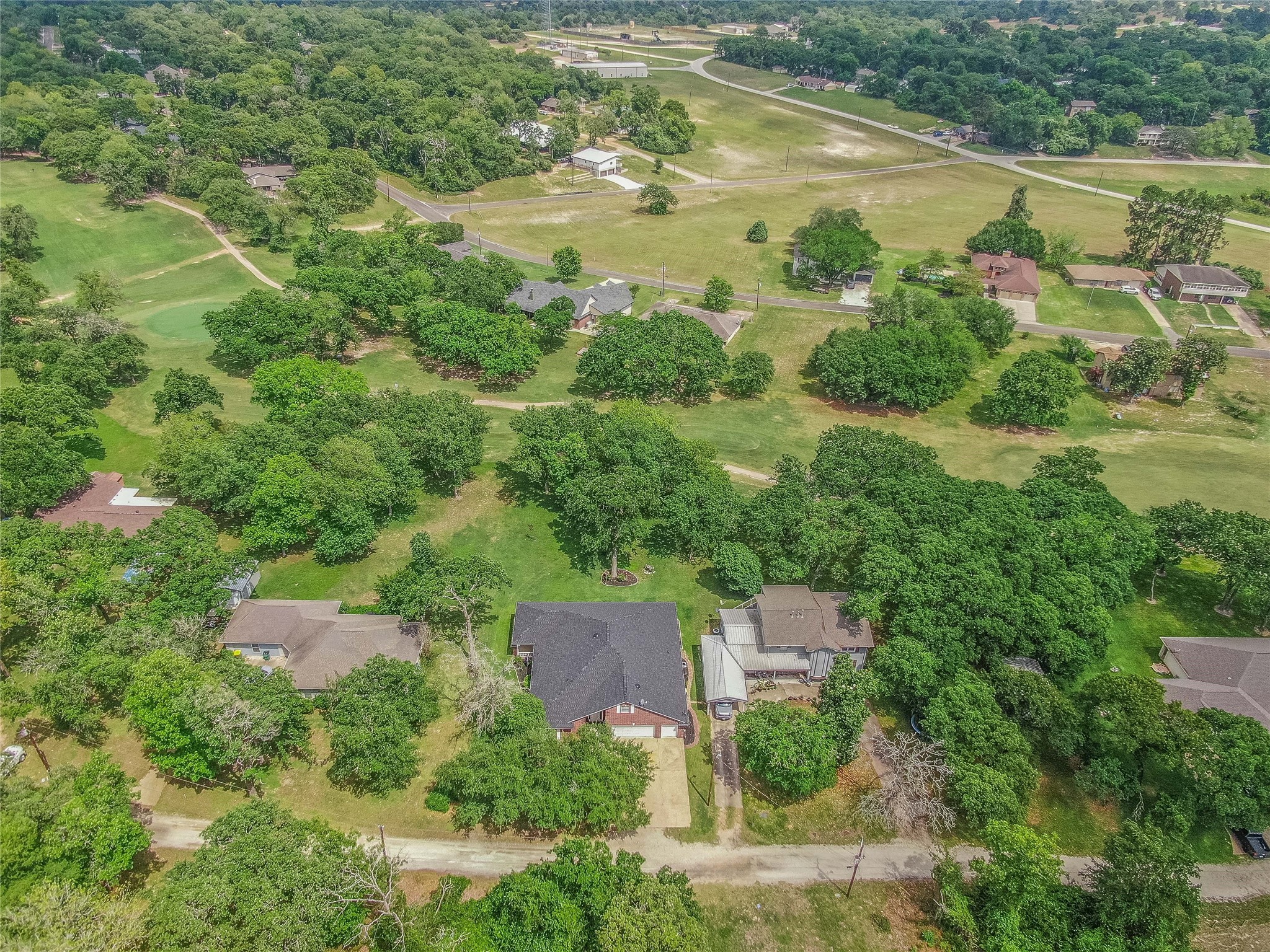 7 Hickory Ridge Lane Normangee, TX 77871 - Photo 44 of 45 an aerial view of a house with a yard and lake view