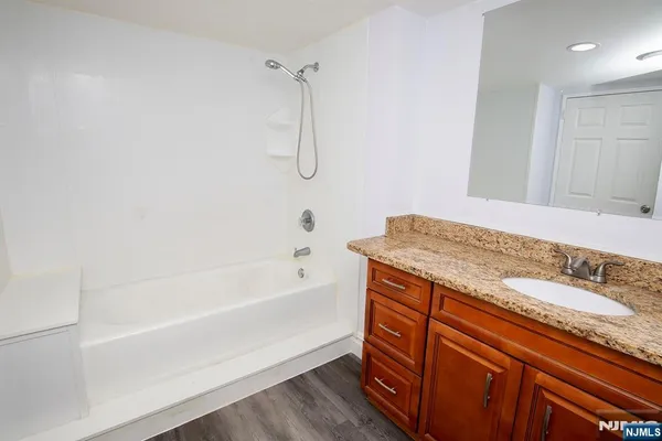 a front view of a house with parking space