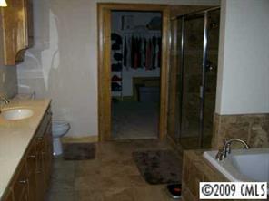 2079 Daytime Road Lancaster, SC 29720 - Photo 6 of 8 a bathroom with a sink and a mirror