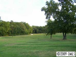 2079 Daytime Road Lancaster, SC 29720 - Photo 8 of 8 a view of grassy field with benches