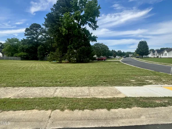 a view of a golf course with a yard