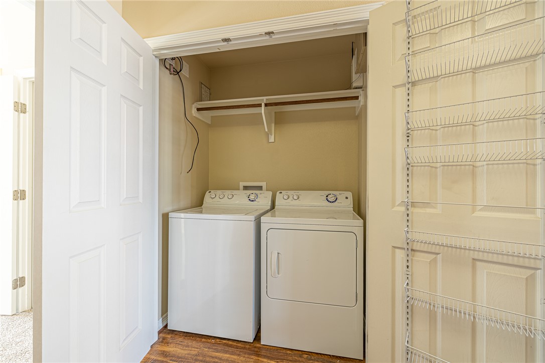 1198 Jones-Butler Road, Unit 2007 College Station, TX 77840 - Photo 4 of 10 a utility room with dryer and washer