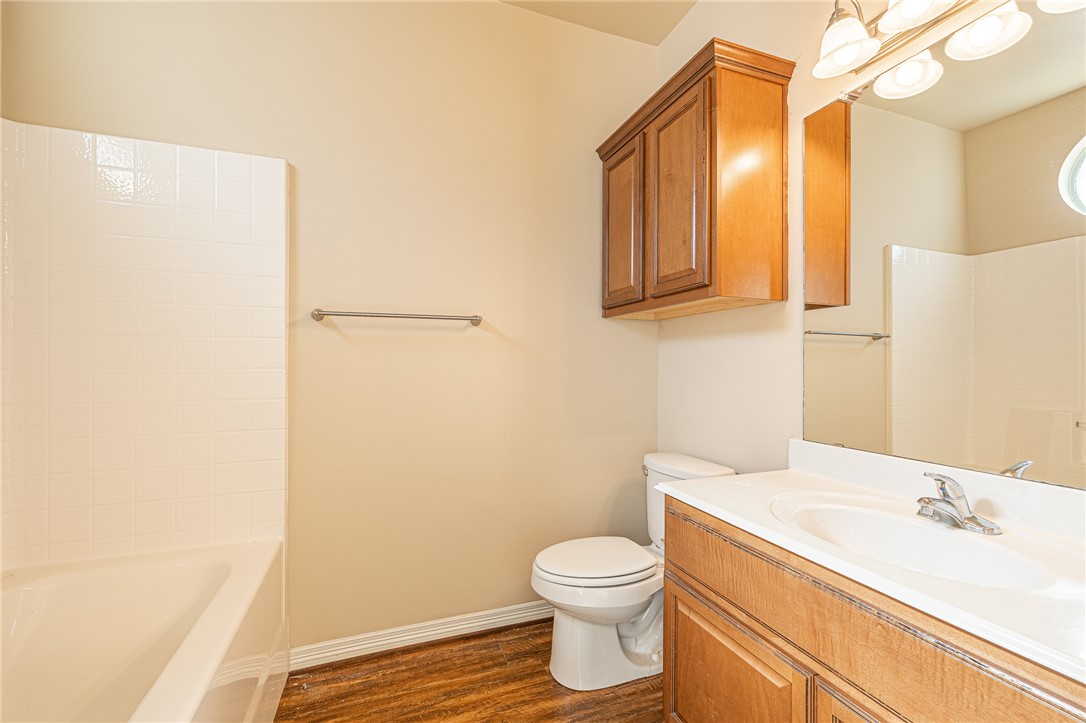 1198 Jones-Butler Road, Unit 2007 College Station, TX 77840 - Photo 6 of 10 a bathroom with a sink and a toilet