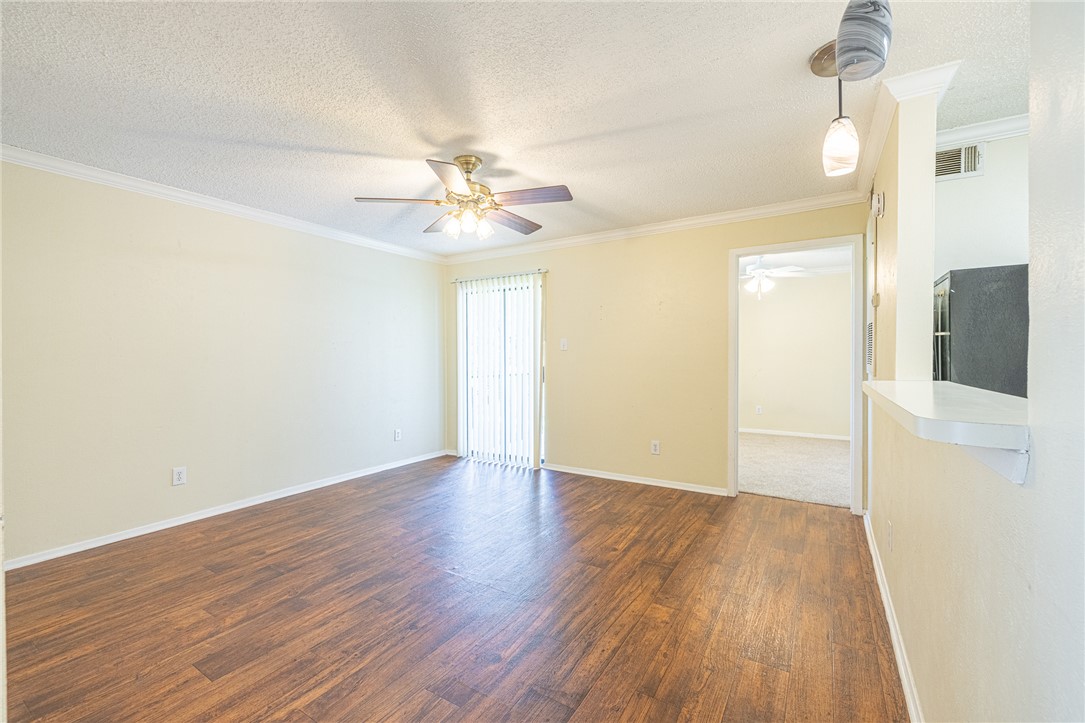 1198 Jones-Butler Road, Unit 2007 College Station, TX 77840 - Photo 10 of 10 a view of an empty room and wooden floor