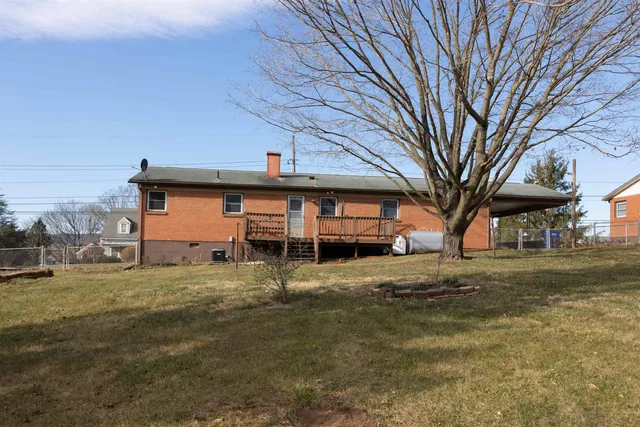 a view of a large trees with a house