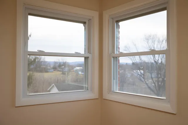 a view of a small space with a large window