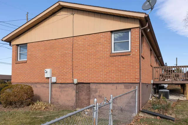 a backyard of a house with seating space