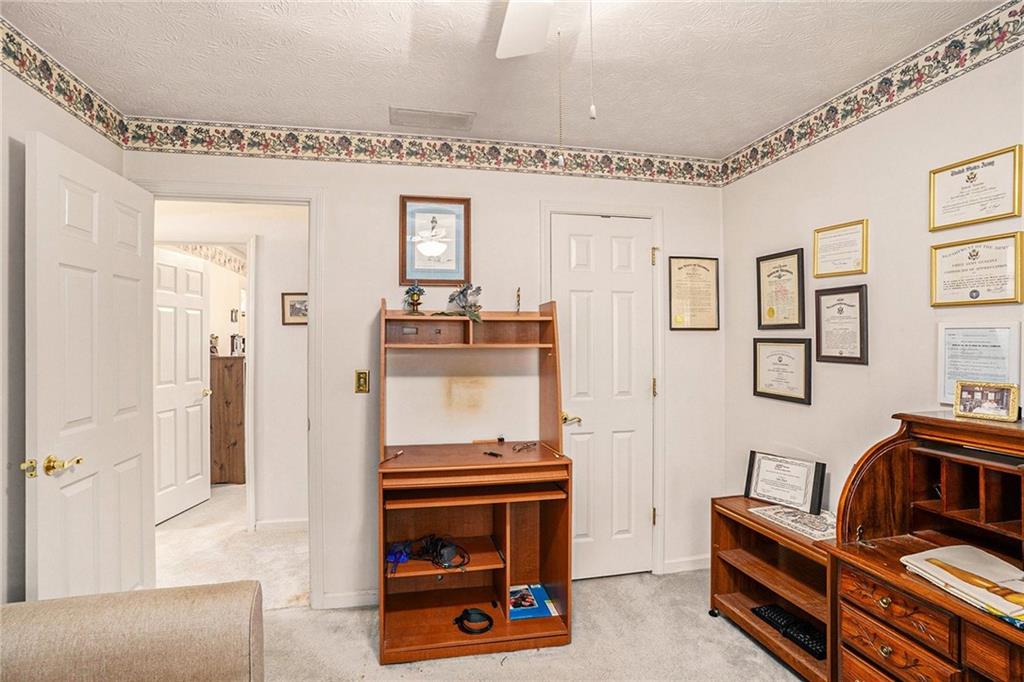 30 Spring Valley Drive Covington, GA 30016 - Photo 13 of 28 a living room with furniture