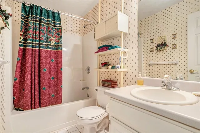 a room with furniture and a large window