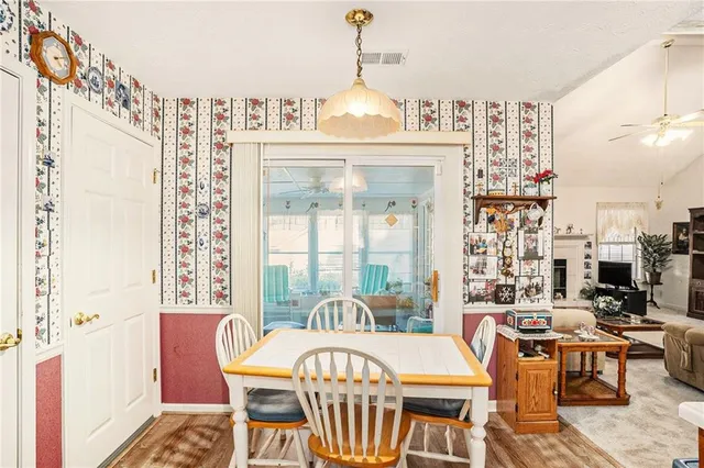 a kitchen with a sink stove and refrigerator