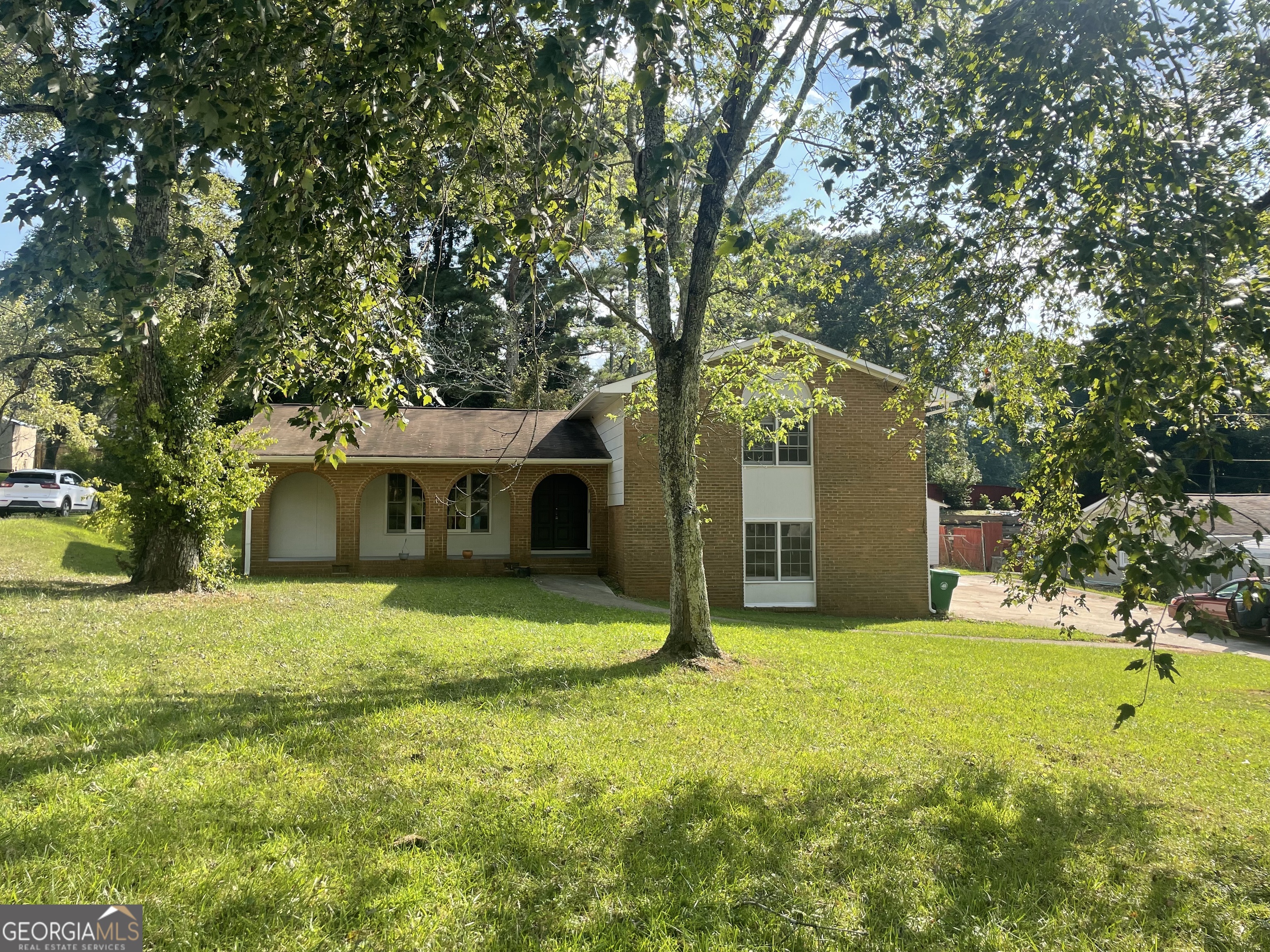 3753 Columbia Parkway Decatur, GA 30034 - Photo 2 of 14 a front view of house with yard and trees