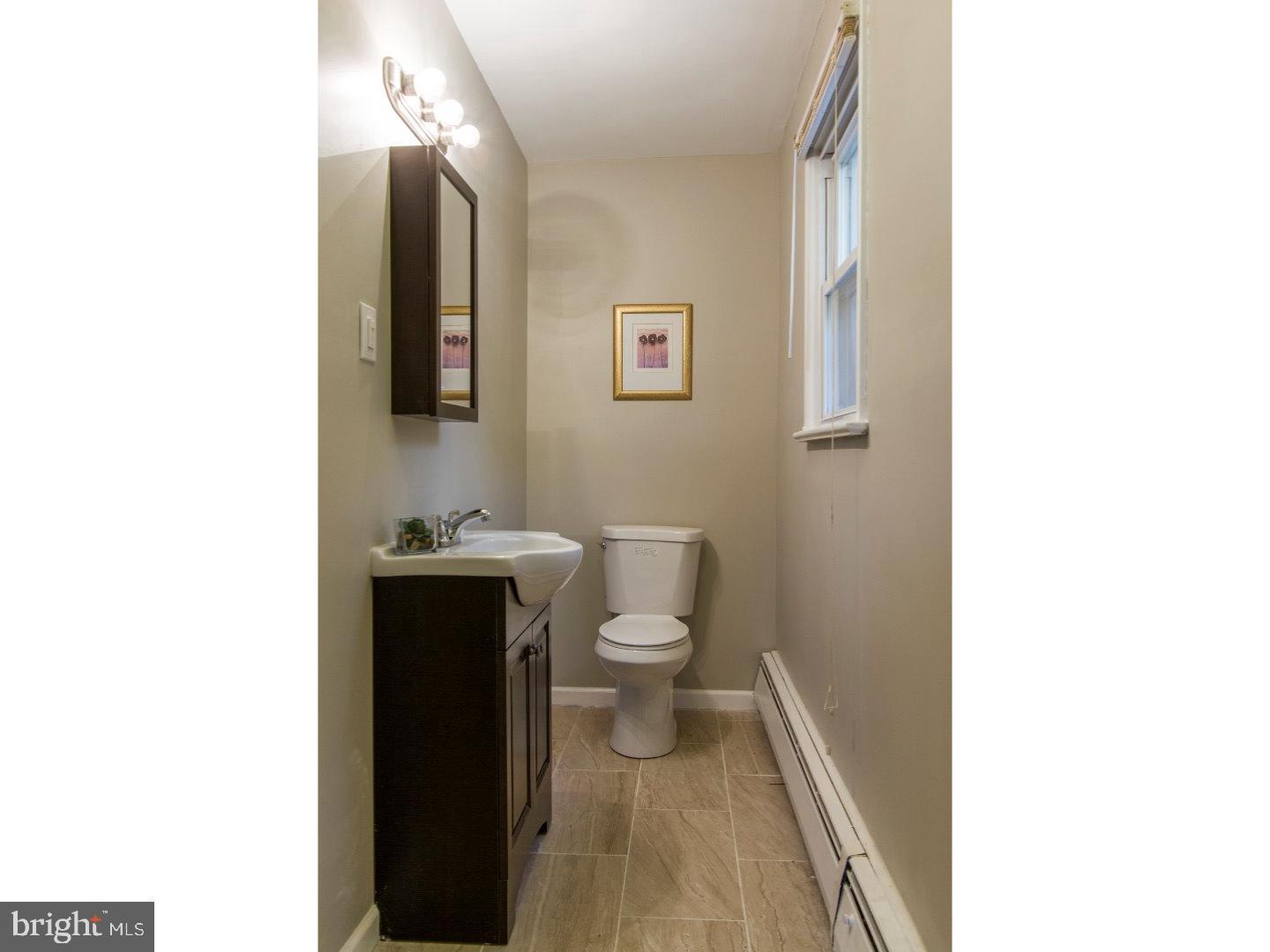 360 Windermere Avenue Lansdowne, PA 19050 - Photo 9 of 20 Charming bathroom with modern touches.