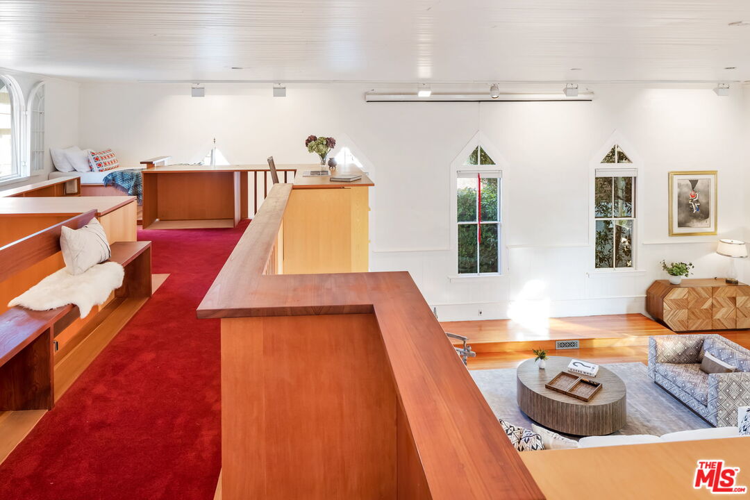 2621 2nd Street Santa Monica, CA 90405 - Photo 23 of 33 a living room with furniture and a table