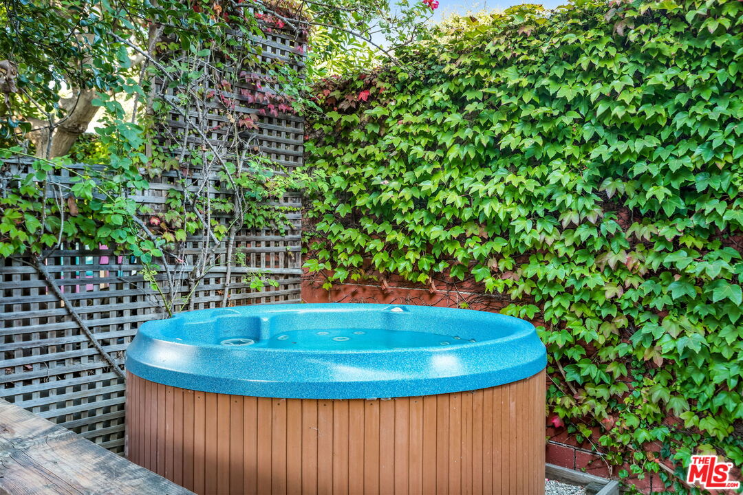 2621 2nd Street Santa Monica, CA 90405 - Photo 31 of 33 a view of a jacuzzi with a tree in the background