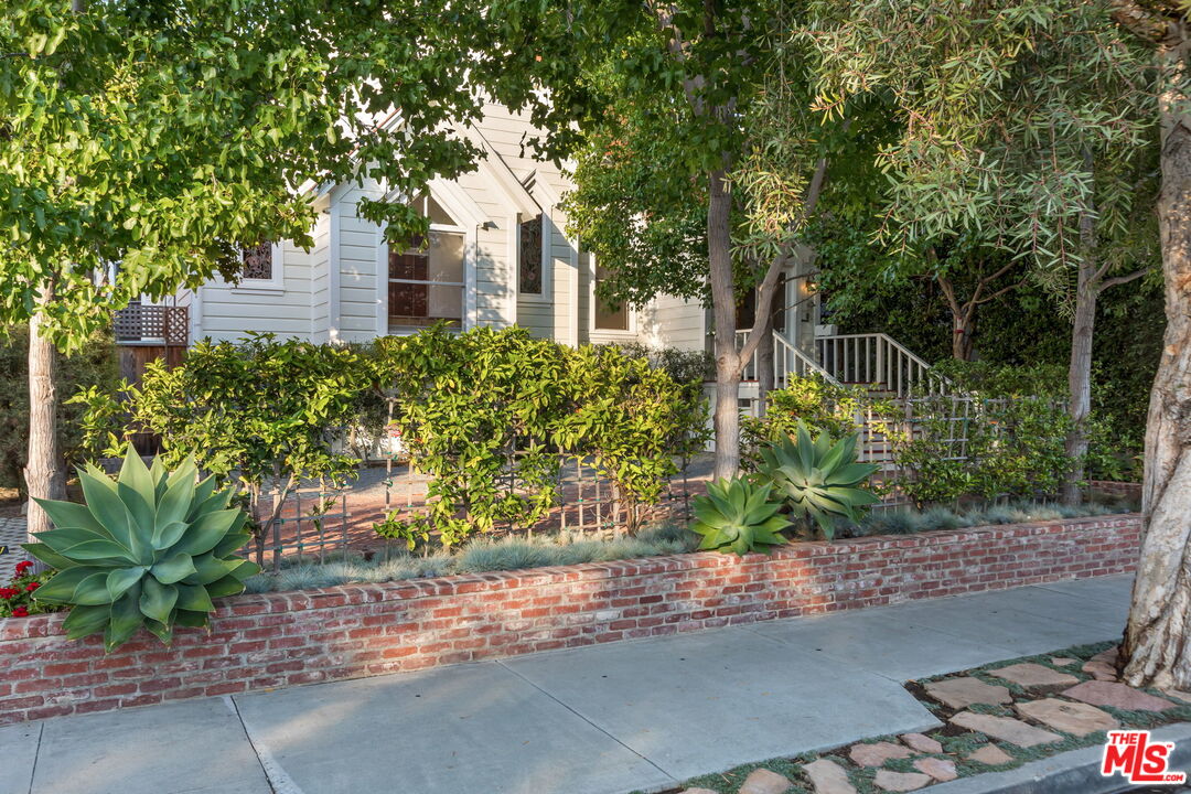 2621 2nd Street Santa Monica, CA 90405 - Photo 32 of 33 a front view of a house with a yard