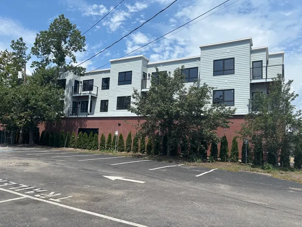 a view of a building with a street