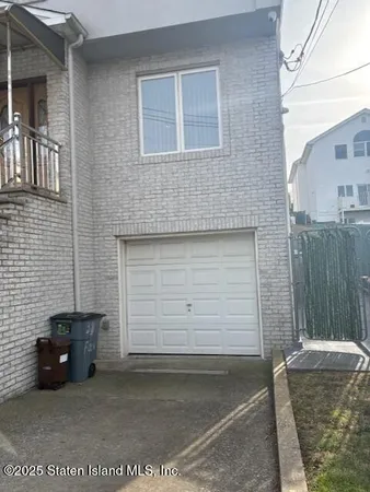 a kitchen with stainless steel appliances granite countertop a refrigerator and a stove