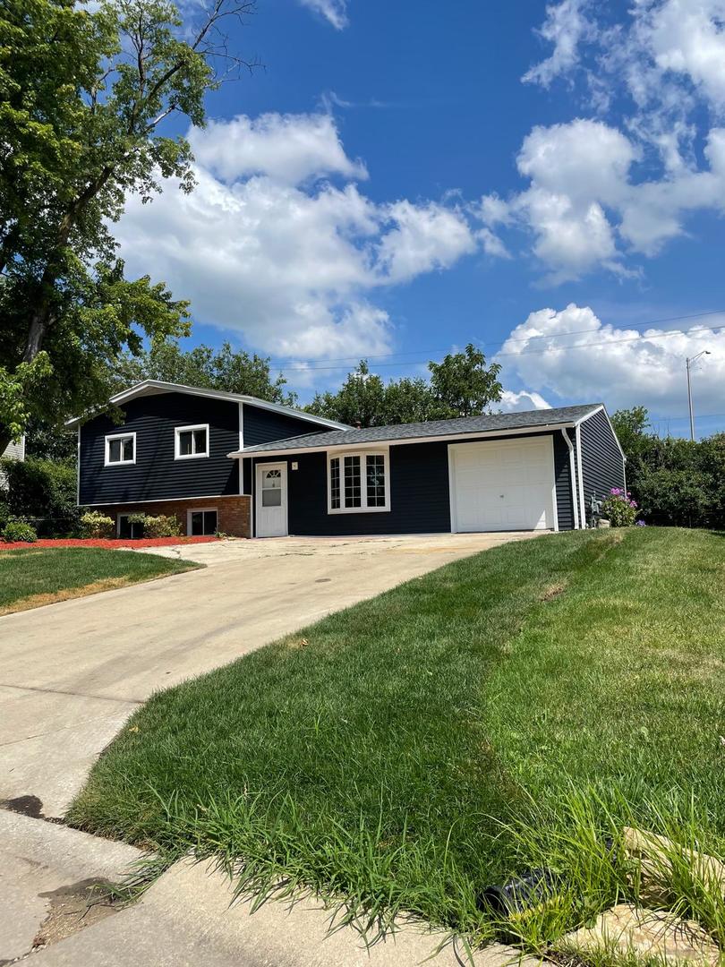 573 Redwood Road Bolingbrook, IL 60440 - Photo 1 of 24 a view of house with a yard