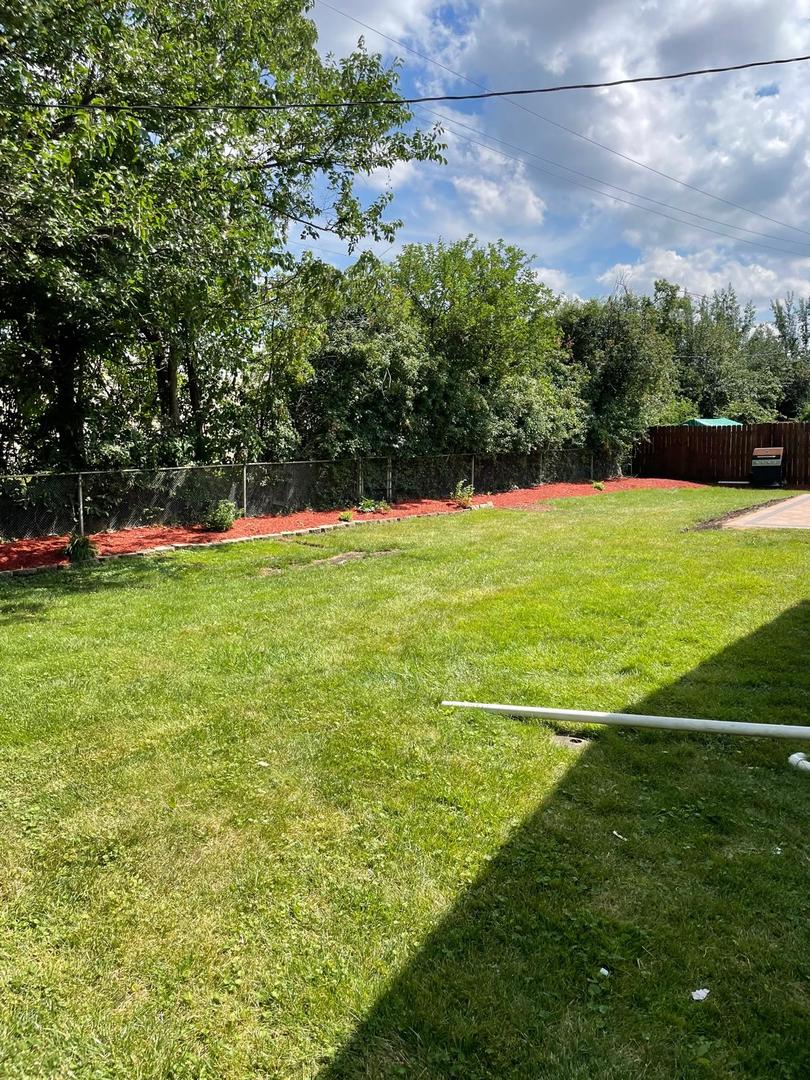 573 Redwood Road Bolingbrook, IL 60440 - Photo 24 of 24 a view of a golf course with a yard