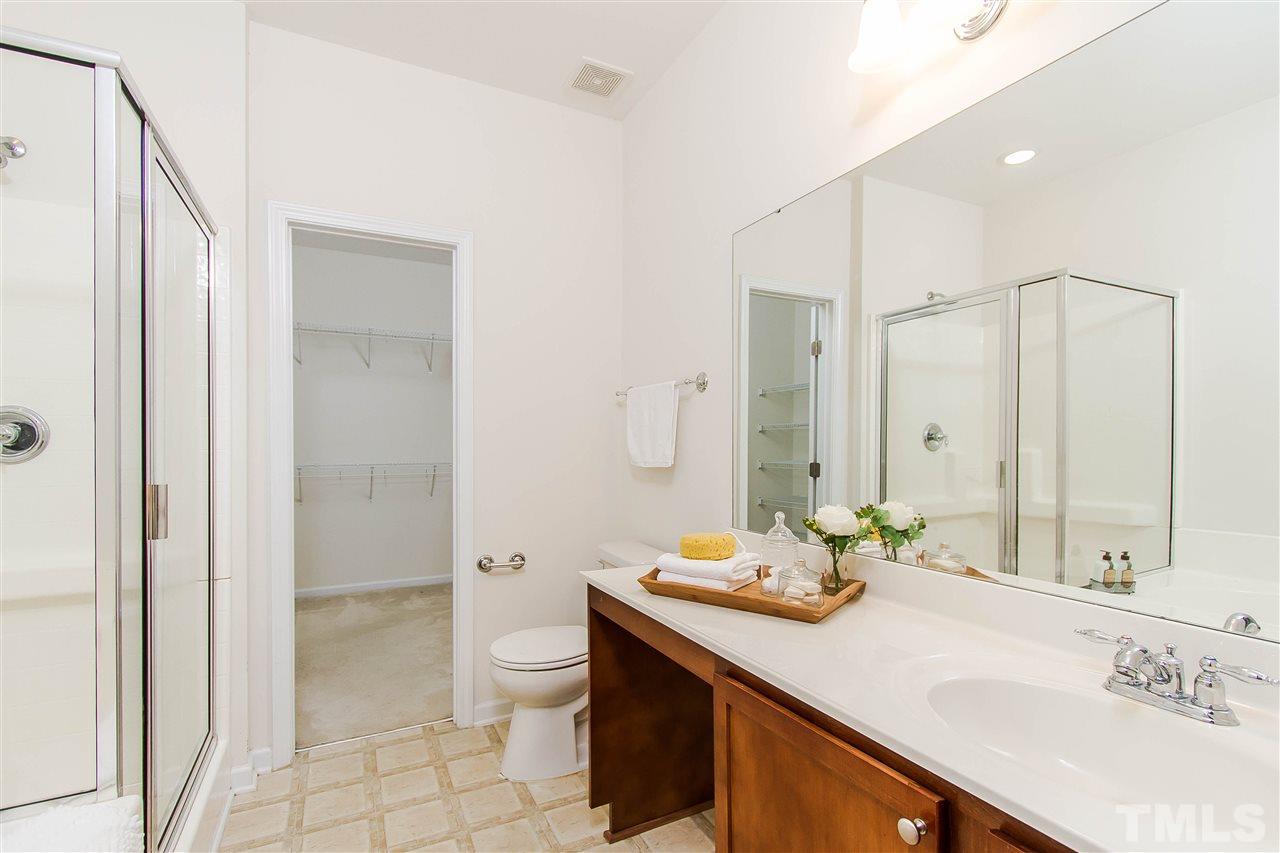 2540 Spring Oaks Way Raleigh, NC 27614 - Photo 12 of 21 Master spa boasts large walk in closet, ample counter space, tile, separate shower, and a large garden tub!