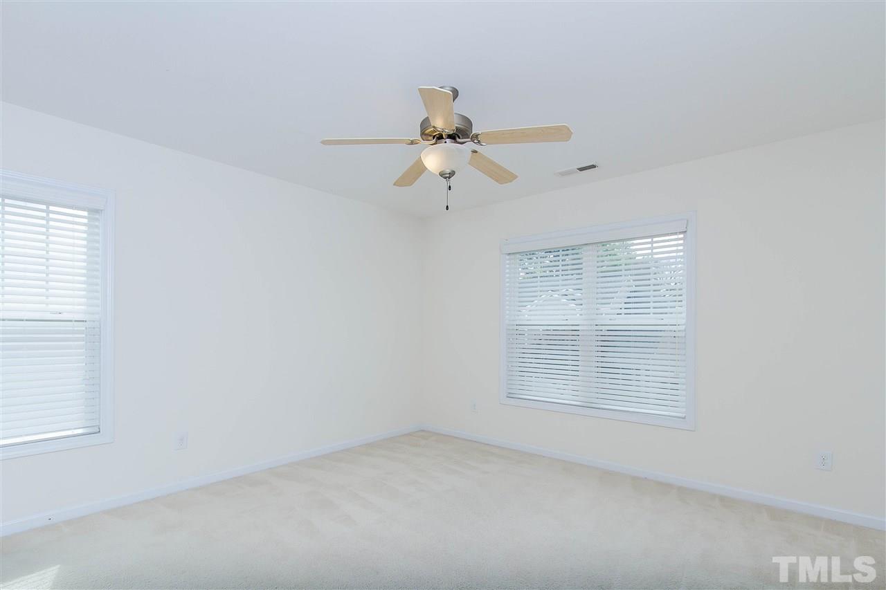 2540 Spring Oaks Way Raleigh, NC 27614 - Photo 16 of 21 Each bedroom boasts ceiling fans and carpet.