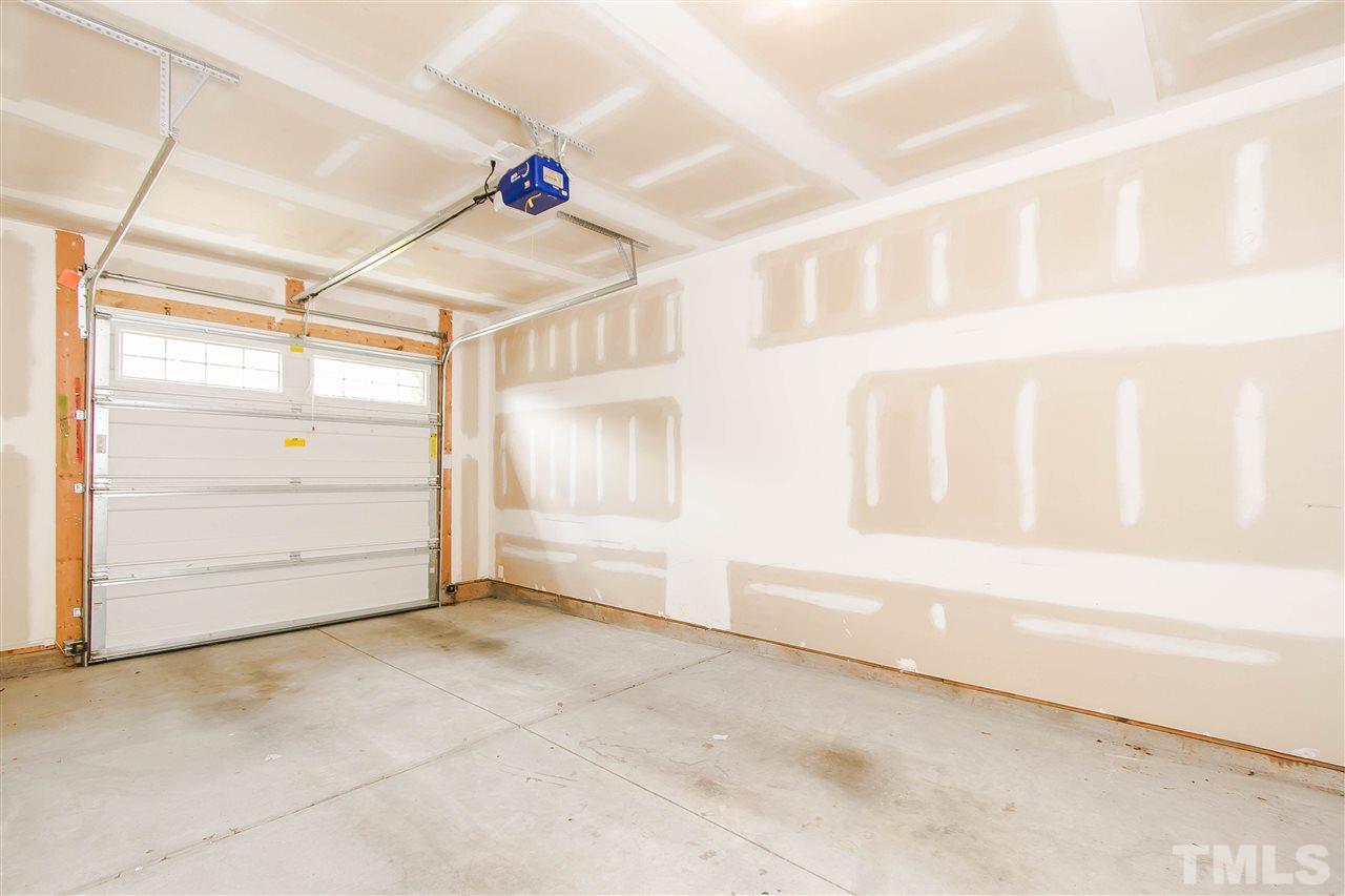 2540 Spring Oaks Way Raleigh, NC 27614 - Photo 20 of 21 Attached front access garage.