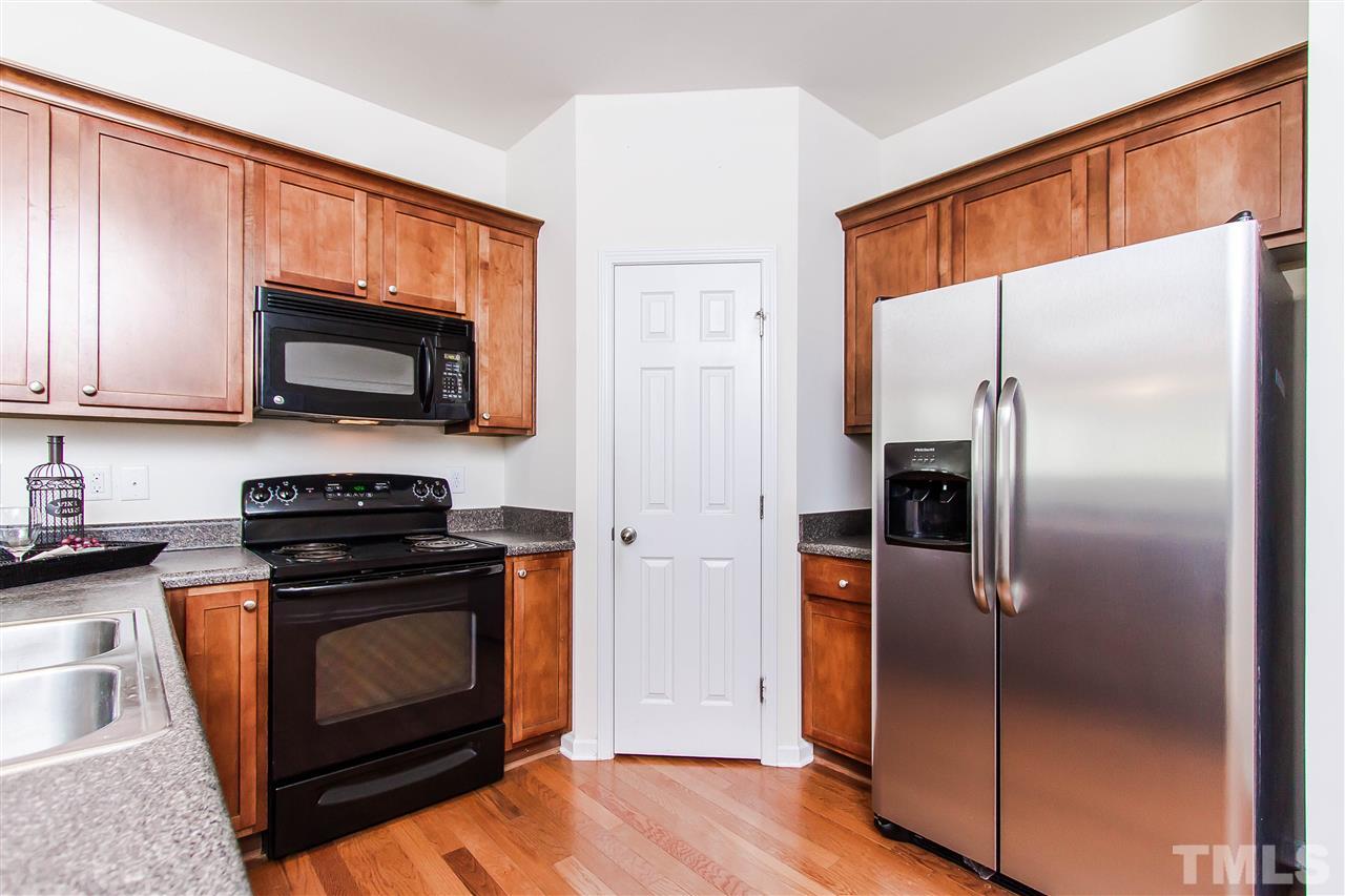 2540 Spring Oaks Way Raleigh, NC 27614 - Photo 5 of 21 Stainless steel refrigerator is offered.