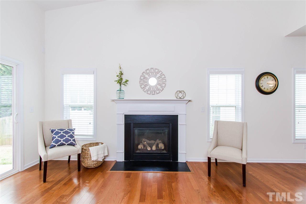 2540 Spring Oaks Way Raleigh, NC 27614 - Photo 9 of 21 Cozy up with a good book in front of your gas log fireplace!