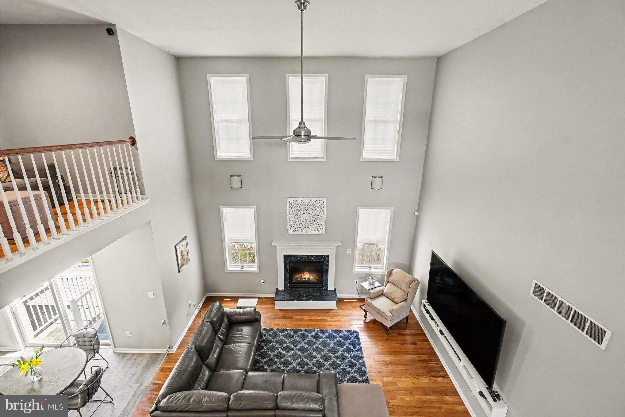 64 Open Meadow Court Elkton, MD 21921 - Photo 17 of 57 a living room with furniture fireplace and a window