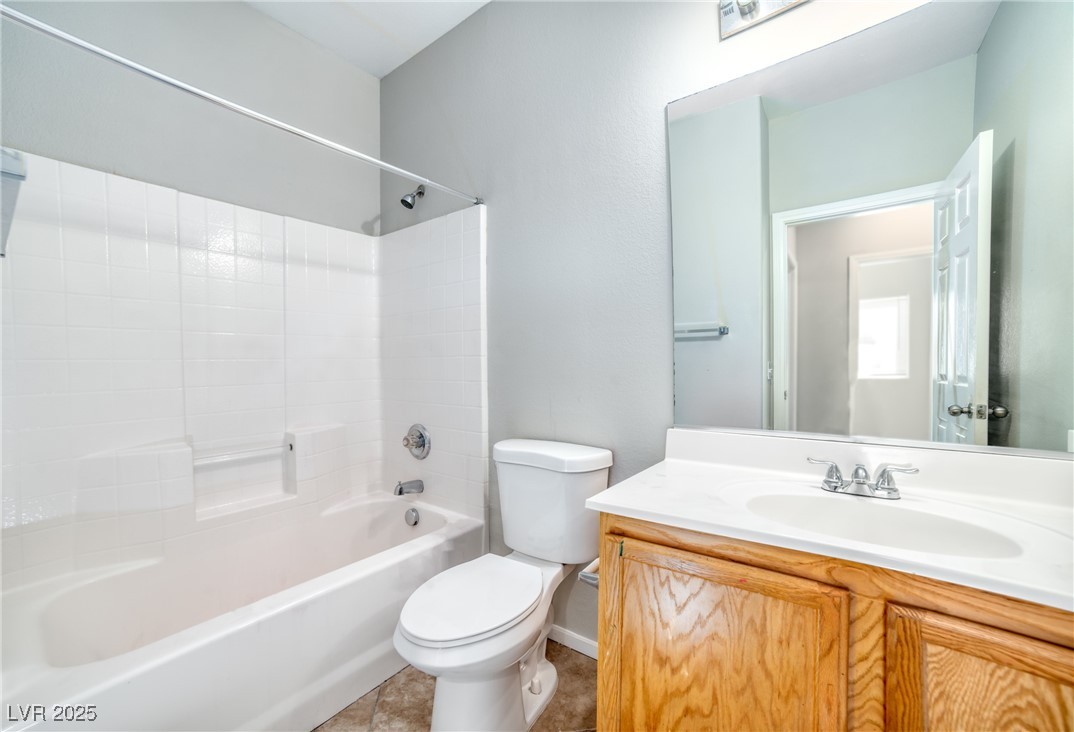 4020 Spring Line Street North Las Vegas, NV 89032 - Photo 10 of 29 Full bathroom featuring vanity and washtub / shower combination