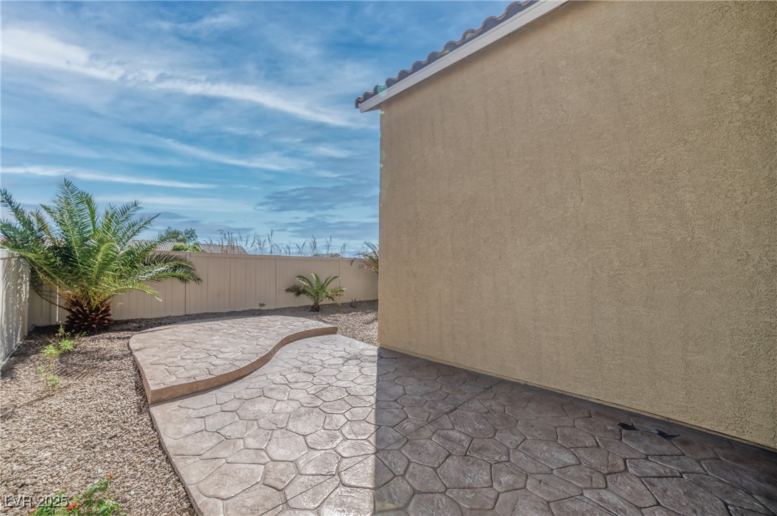4020 Spring Line Street North Las Vegas, NV 89032 - Photo 21 of 29 Fenced backyard with a patio
