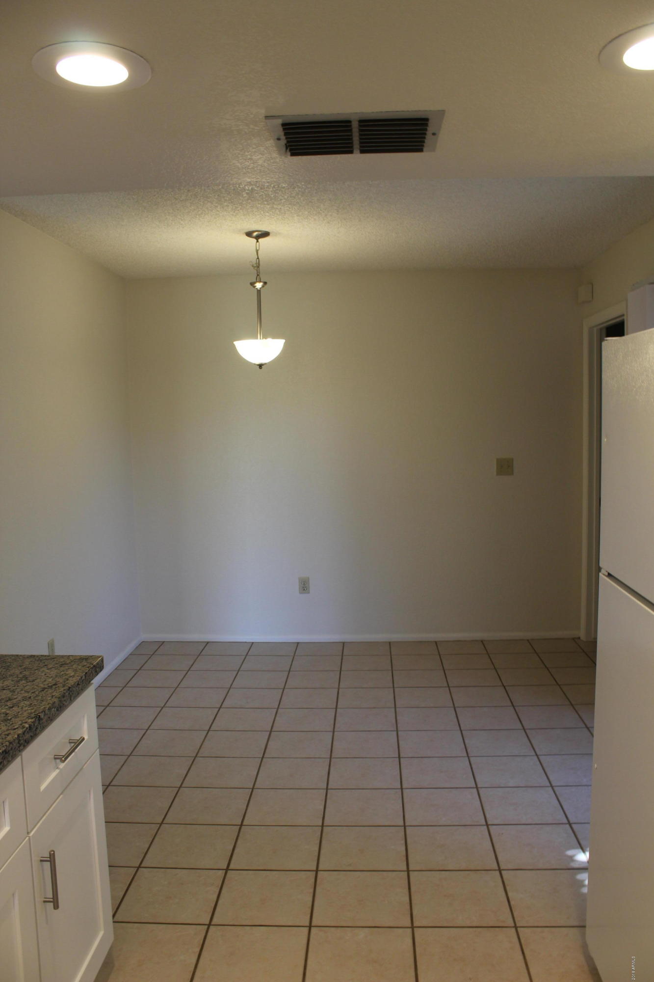 5940 East Spring Road Scottsdale, AZ 85254 - Photo 9 of 23 a view of an empty room with a sink