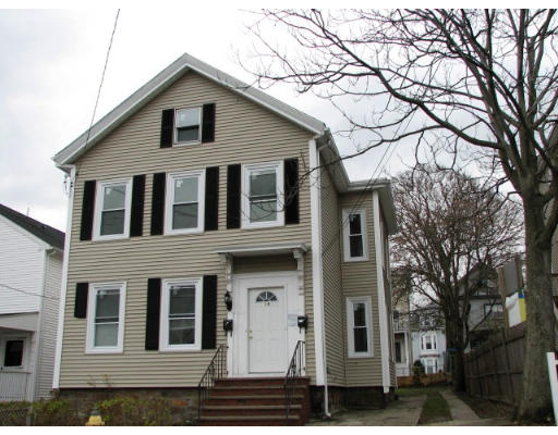 19 Burrell Street Boston, MA 02119 - Photo 1 of 20 a view of a brick house with large windows