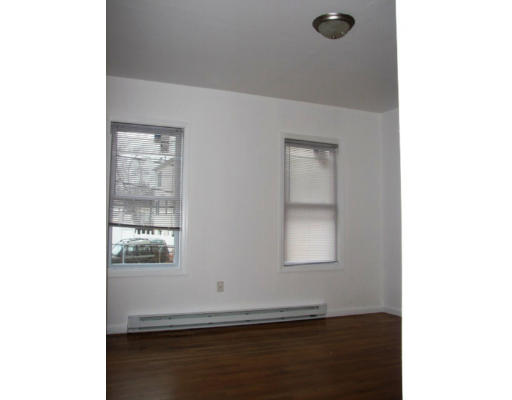 19 Burrell Street Boston, MA 02119 - Photo 12 of 20 a view of an empty room and window