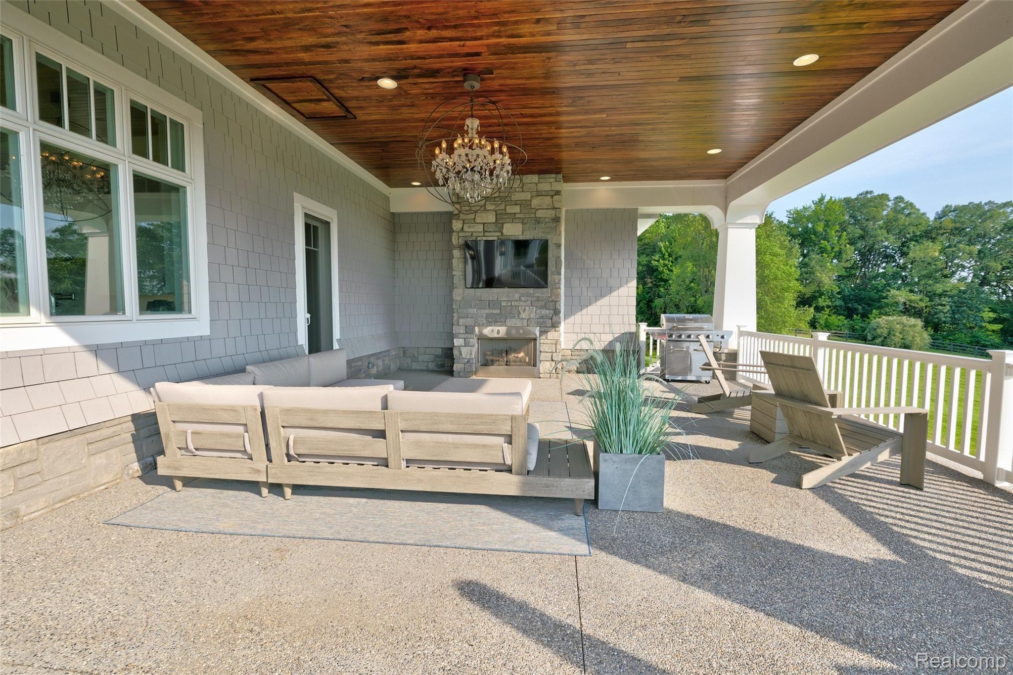 5284 Shields Road Holly, MI 48442 - Photo 85 of 97 Covered Balcony with Gas Fireplace