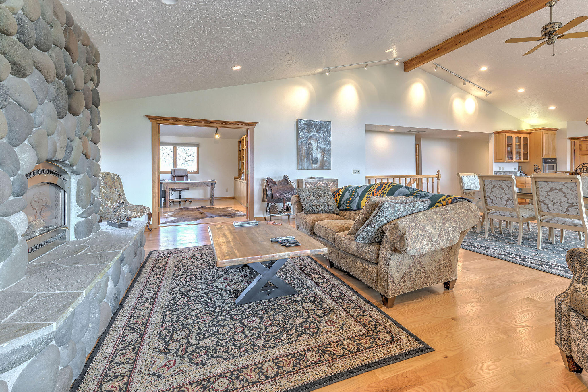 60975 Billadeau Road Bend, OR 97702 - Photo 26 of 65 a living room with lots of furniture and a rug