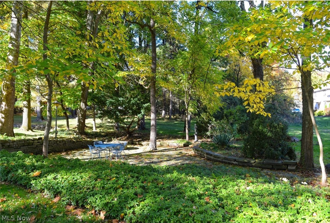 5875 Mill Road Broadview Heights, OH 44147 - Photo 26 of 31 Sunken flagstone, lit sculptured garden terrace