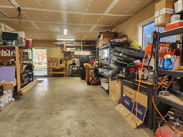 a view of a storage room with racks