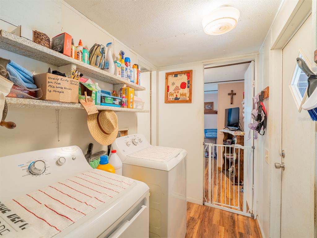 15429 Northeast 38th Court Citra, FL 32113 - Photo 18 of 53 a bedroom with a bed and a cabinets