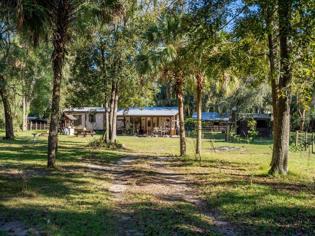15429 Northeast 38th Court Citra, FL 32113 - Photo 38 of 53 a view of a house with a big yard